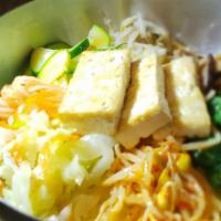 채식비빔밥 /  Vegetarian Bibimbap · Steamed white rice topped with assorted marinated vegetables with tofu and spicy gochujang (...