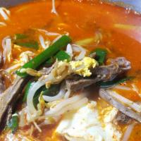 육개장 / Yuk Gae Jang · Shredded beef, green onion and bean sprouts in spicy egg drop soup. Served with kimchi, ban ...