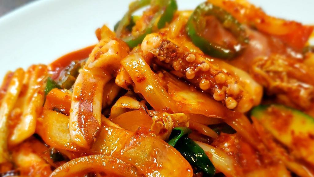 오징어볶음 / Stir-Fried Squid · Ohjinguh Bok eum / Stir-fried squid and vegetables with special spicy sauce. Served with kimchi, ban chan (Vegetables) and white rice.