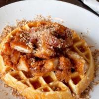 Southdown Chicken & Waffle · Classic Belgian Waffle Topped with Maple Fried Chicken Tenders Topped w. Toasted Pecan, Cand...