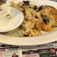 Stuffed Mushrooms · Three pieces, with crabmeat.