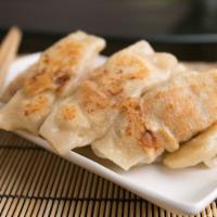 Hot Item - Pan Fried Chive & Pork Dumpling · Chive, pork , ginger.
