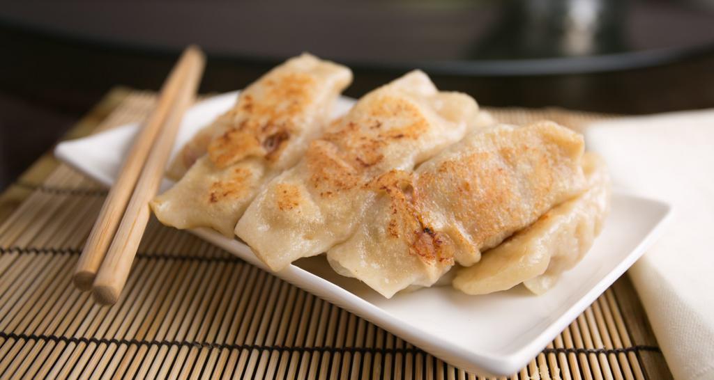 Hot Item - Pan Fried Chive & Pork Dumpling · Chive, pork , ginger.