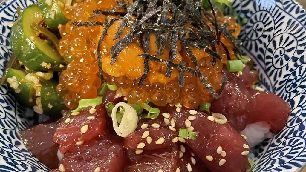 Poke Don Special · Rice topped tuna , hamachi or salmon , classic or spicy mayo and salmon roe(ikura),sea urchin(uni) with seaweed salad,cucumber salad,laver sesame seed