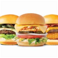 Trio Burger · Three burgers. Includes Roma tomato, leaf lettuce, shaved onions, pickles, American cheese a...