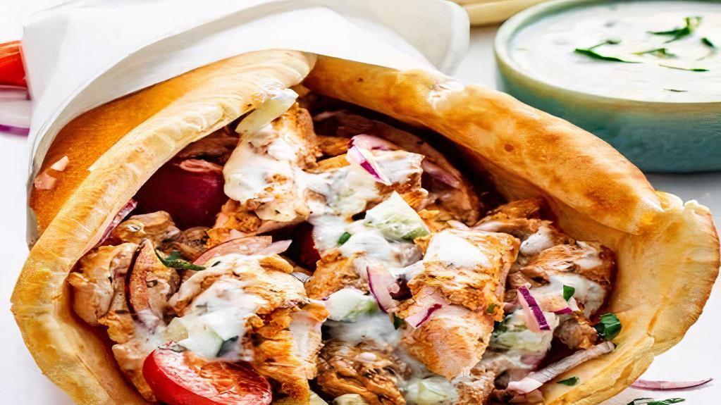 Chicken Gyro Wrap · Chunks of Chicken in Gyro wrap with Lettuce, Tomato, Onion, Green peppers & Gyro sauce