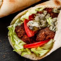 Falafel Gyro Wrap · Chunks of Falafel in Gyro bread with Lettuce, Tomato, Onion, Green peppers & Gyro sauce
