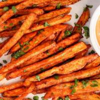 Masala Tri Fries · Our Specialty Tri fries, seasoned with masala spice mix