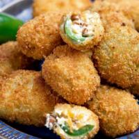 Jalapeños & Cheese Poppers · Hot and crunchy Poppers, comes with Marinara sauce
