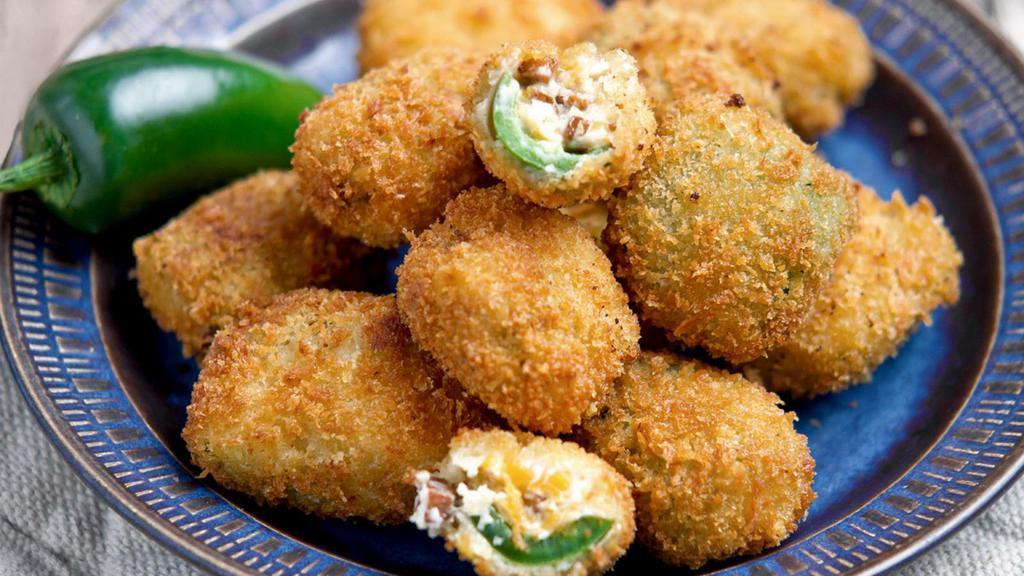 Jalapeños & Cheese Poppers · Hot and crunchy Poppers, comes with Marinara sauce