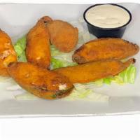 Jalapeno Poppers · fresh jalapeños, five cheese blend, chorizo, bacon, ranch dressing