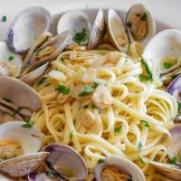 Linguine With White Clam Sauce · Pasta in a white wine & butter sauce topped with clams.