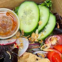 House Salad · Mixed green, romaine lettuce, red onion, tomato, cucumber, radish, peanut sauce dressing, fr...