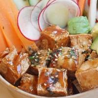 Crispy Teriyaki Tofu Bowl · Jasmine rice, Crispy teriyaki tofu, cucumber, carrot, scallion, radish, avocado, sesame.