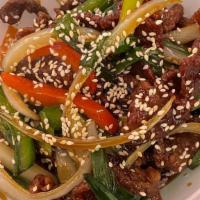 *Crispy Beef · Spicy. Bell pepper and onion with Sesame spice sauce.