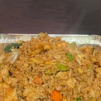 *Thai Basil Fried Rice · Spicy. Basil, egg, chicken, shrimp, Green chili, Garlic, bell pepper, onion & Scallion.