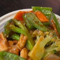 Hong Kong Crispy Noodle · Chicken and shrimp stir-fry with mixed vegetables in brown sauce over pan-fried noodle.
