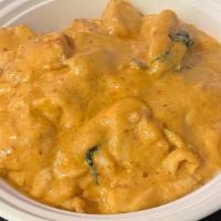 *Massaman Curry · Spicy. Onion, roasted peanuts, potato & basil in yellow curry sauce.