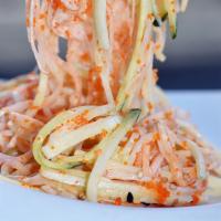 Kani Salad · Chopped cucumber and crab topped with spicy mayo and masago.