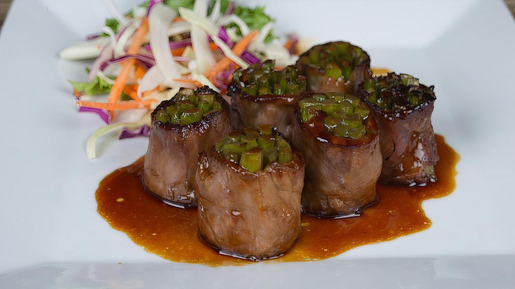 Beef Negimaki · Scallion wrapped in thinly sliced beef and served with teriyaki saute.