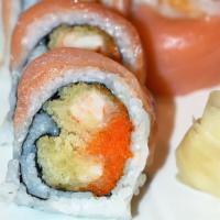 Smokey Roll · Shrimp tempura, spicy mayo, masago & scallion topped with a fresh cut of smoked salmon.