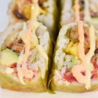 Green Monster · Crunchy spicy tuna, mango, avocado and tempura eel wrapped in green soy paper and drizzled w...
