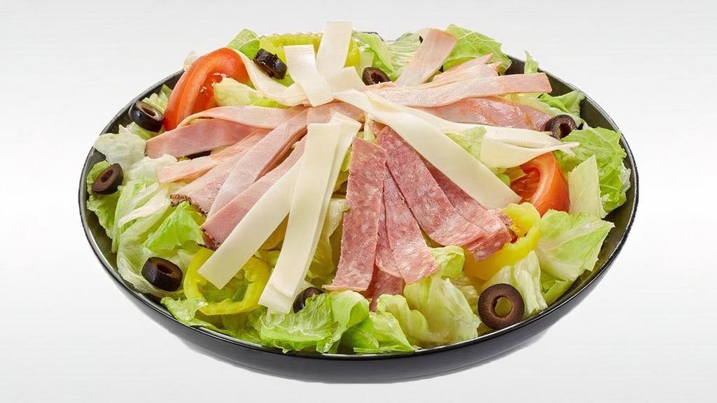 Antipasto Salad  · Crisp lettuce blend topped with slow-cured ham, salami, capicola, prosciuttini, provolone, tomatoes, banana peppers and black olives with Italian dressing