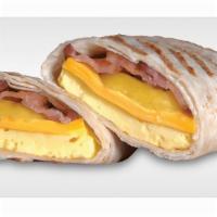 Breakfast Burrito · Eggs, cheese and your choice of sausage, bacon or ham wrapped in a tortilla with onion and b...
