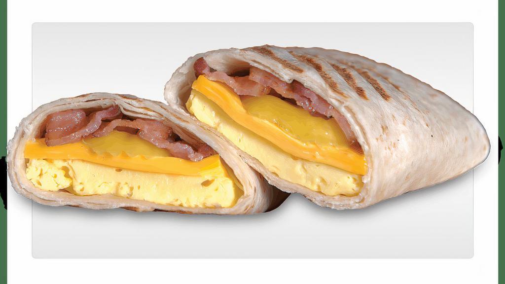 Breakfast Burrito · Eggs, cheese and your choice of sausage, bacon or ham wrapped in a tortilla with onion and banana peppers