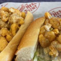 Small Shrimp Po Boy · Perfect for those observing Lent!

Fried shrimp, lettuce, tomato, pickles, and our housemade...