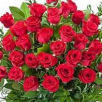 Room Full Of Roses / 3 Dozen Roses · This awesome arrangement of red roses will fill your room with grace and beauty.