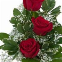 Simply Roses · A simple and beautiful vase filled with three red roses.

Approximately 4