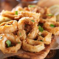 Fried Calamari · Tender hand breaded and lightly fried calamari served with marinara.