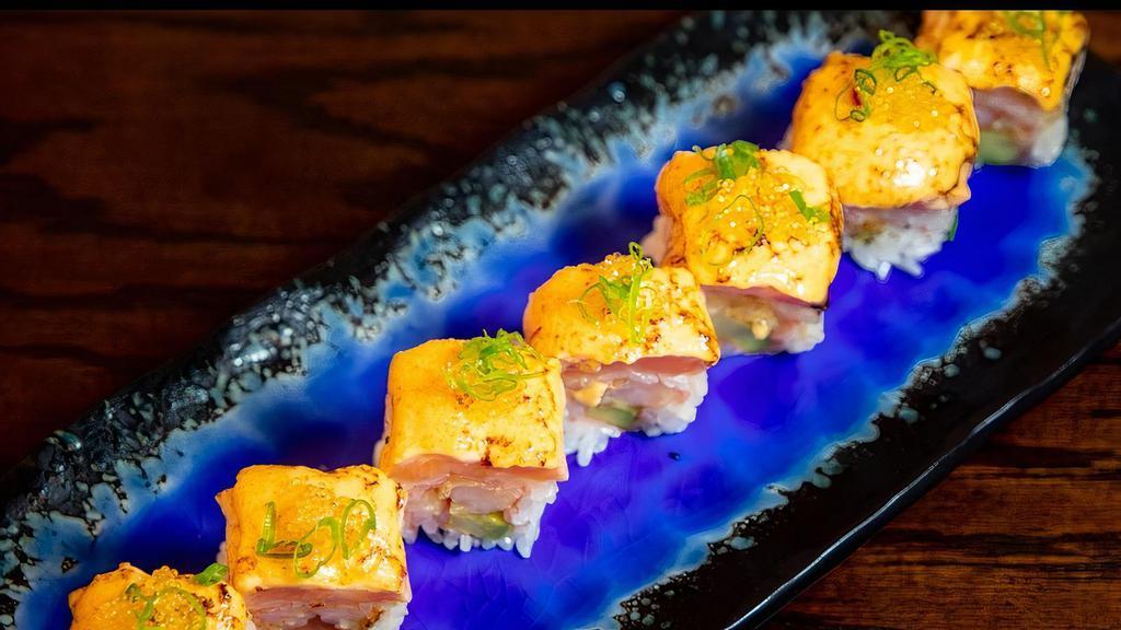 Orion Roll · shrimp tempura, avocado, soybean paper torched salmon, spicy mayo & yuzu tobiko