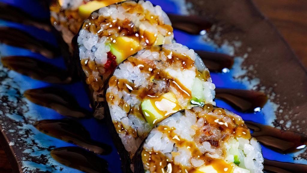 Spider Roll  · soft shell crab, avocado, cucumber, eel sauce & red tobiko