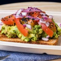 Avocado Toast · Served with seven grain toast, tomato, onions, red pepper, salt, sesame seeds.