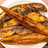 Hand Cut Potato Wedges · Potatoes sliced thick, gently seasoned with salt + pepper and deep fried to perfection. Simp...