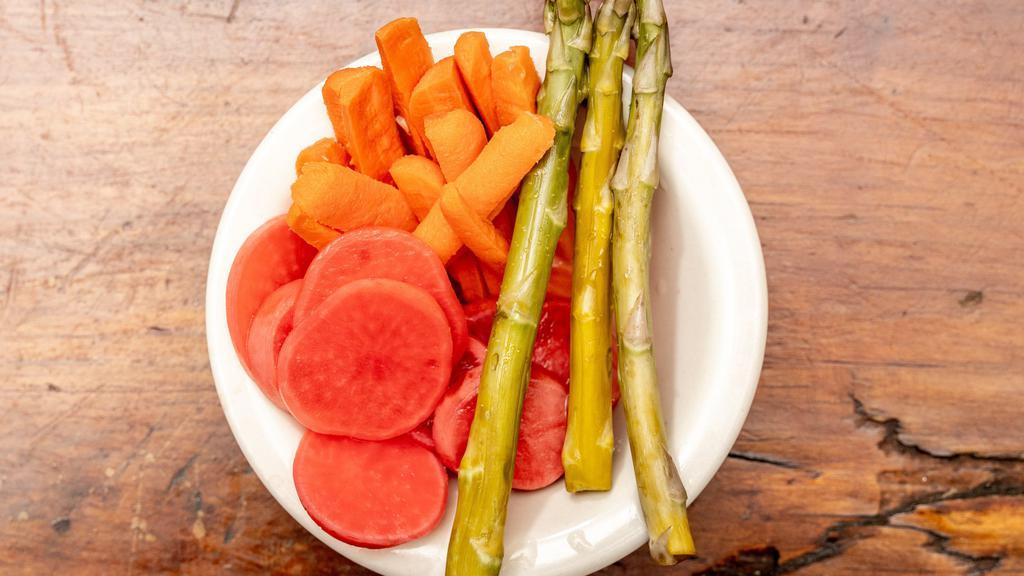 House Made Pickle Plate · Seasonal Veggies quick pickled with garlic and spices!