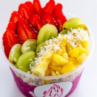 The Dragon Fruit Pitaya Bowl · Pitaya, banana, strawberry, pineapple, lemon, fresh basil and coconut water. Toppings: grano...