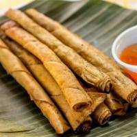 Shanghai Lumpia · Spicy and ask for availability. Wrap in spring roll wrapper (thin like cigarillo) - ground p...