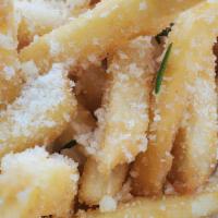 Fuggedaboutit Fries · Crispy Fries Lightly Tossed in our Rosemary Garlic Parmesan Sauce.