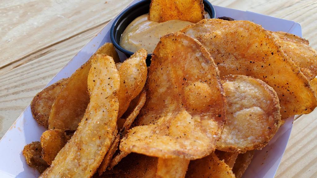 My Chips Dont Lie · Fresh Cut Homemade Potato Chips Tossed in our NoCo Dust, Served with Our Homemade Remoulade as a Dipping Sauce.