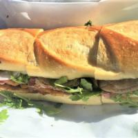 The G2 Sandwich · Chicken cutlet, soppressata, asiago, marinated eggplant, long hots, arugula and olive oil.