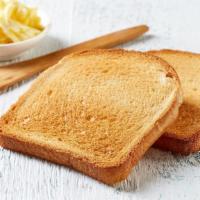 Buttered Toast · Light brown buttered toast.