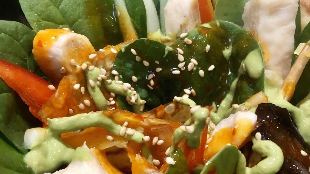*Thai Chicken · Sliced chicken breast, mesclun mix, Red peppers, cucumbers, julienned carrots, cilantro, Thai dressing, wasabi tofu sauce and sesame seeds.