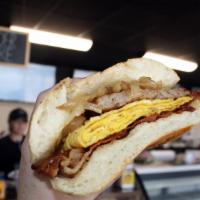 Super Sandwich Breakfast · 2 eggs, sausage, bacon, swiss cheese, and grilled onion on a roll.