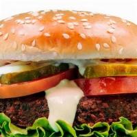 Falafel Big Burger (1/4 Lb) · Vegetarian. Tahini sauce, leaf lettuce, pickles, shaved onions and roma tomatoes.