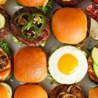 The Party Box · Sixteen of our burgers. Choose up to 4 styles. All burgers comes with American cheese, onion...