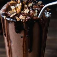 Chocolate Milkshake · Delicious blended milkshakes with whipped cream topping.