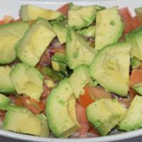 Avocado Salad · Chopped avocado, tomatoes, onions, and jalapenos mixed with dressing.